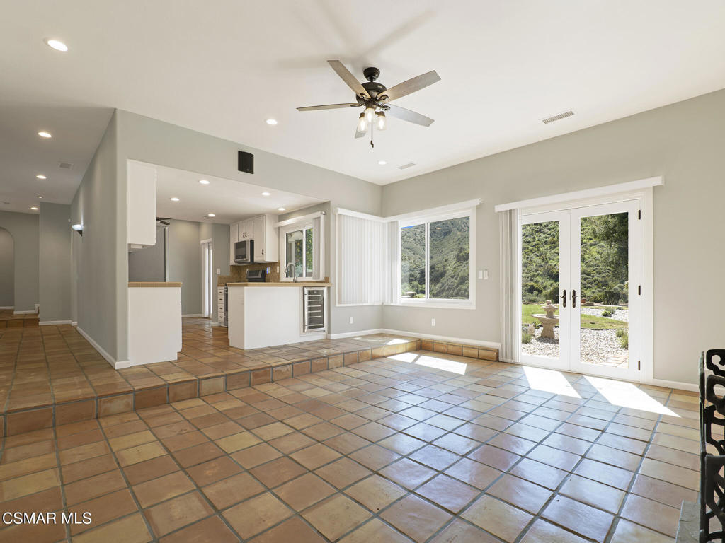 1590 Meander Drive Simi Valley, CA 93065 - Photo 11 of 57 a view of an empty room with a window and kitchen view