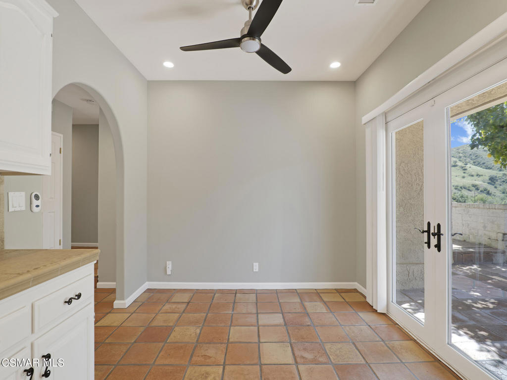 1590 Meander Drive Simi Valley, CA 93065 - Photo 19 of 57 a spacious bathroom with a granite countertop sink a mirror and a shower