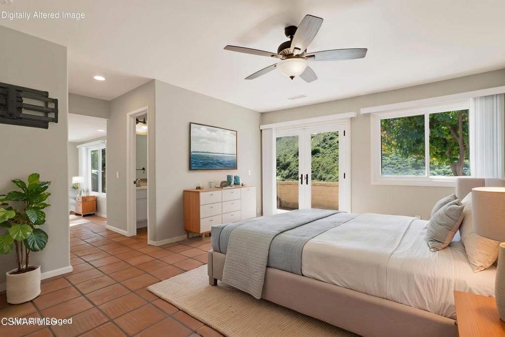 1590 Meander Drive Simi Valley, CA 93065 - Photo 21 of 57 a bedroom with a large bed and a window