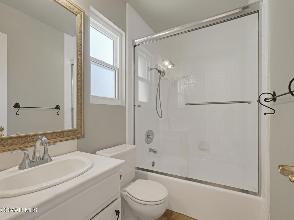 1590 Meander Drive Simi Valley, CA 93065 - Photo 24 of 57 a bathroom with a sink a toilet and shower