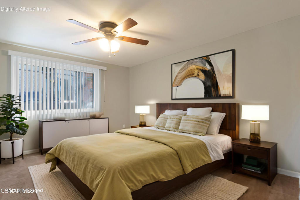 1590 Meander Drive Simi Valley, CA 93065 - Photo 35 of 57 a bedroom with a bed and a chandelier