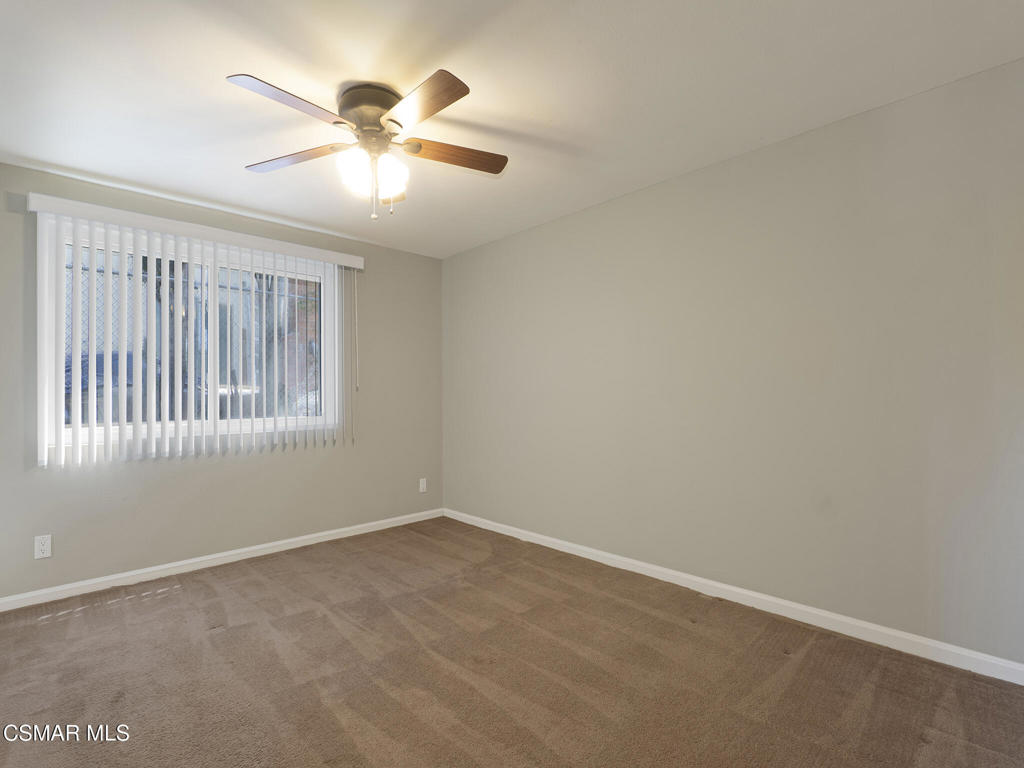 1590 Meander Drive Simi Valley, CA 93065 - Photo 36 of 57 an empty room with fan and windows
