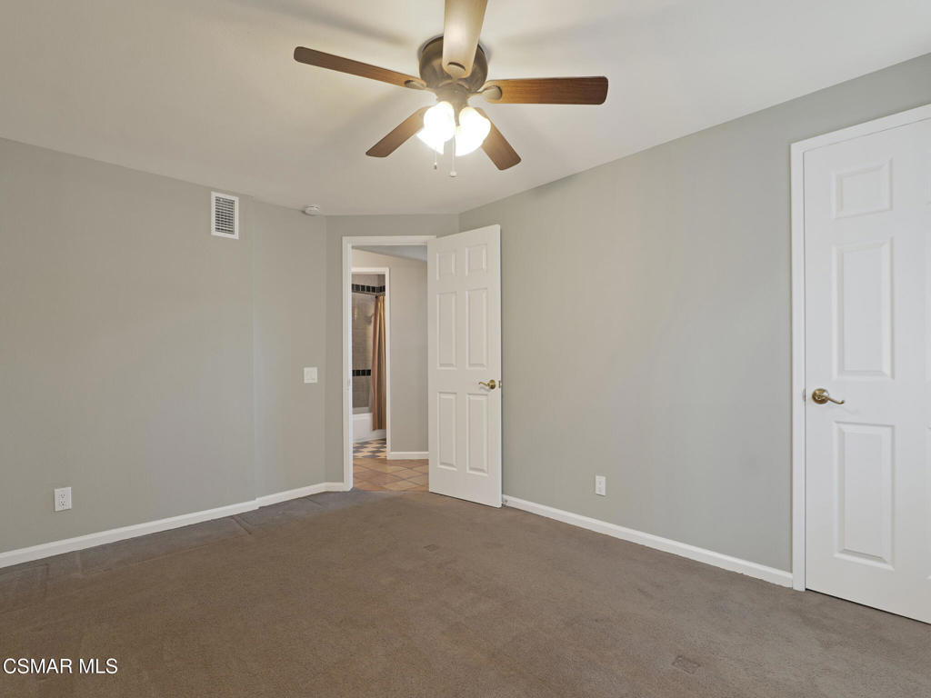 1590 Meander Drive Simi Valley, CA 93065 - Photo 37 of 57 an empty room with chandelier fan
