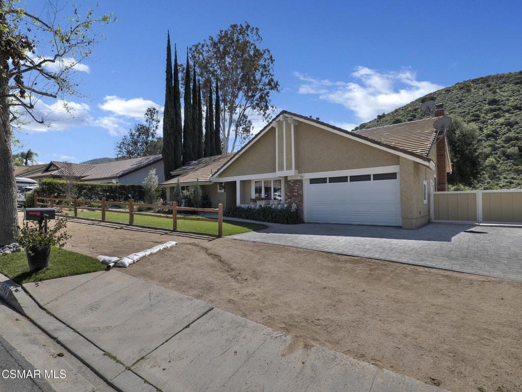 1590 Meander Drive Simi Valley, CA 93065 - Photo 4 of 57 a view of a house with a swimming pool