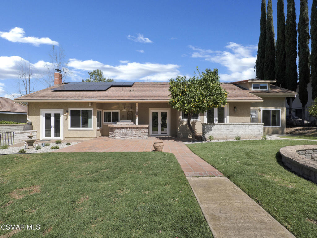 1590 Meander Drive Simi Valley, CA 93065 - Photo 41 of 57 a front view of a house with a yard