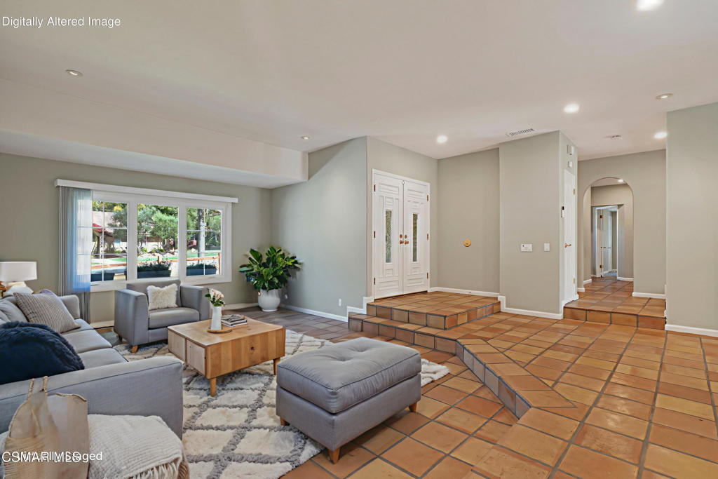1590 Meander Drive Simi Valley, CA 93065 - Photo 5 of 57 a spacious bedroom with a large window and a couch