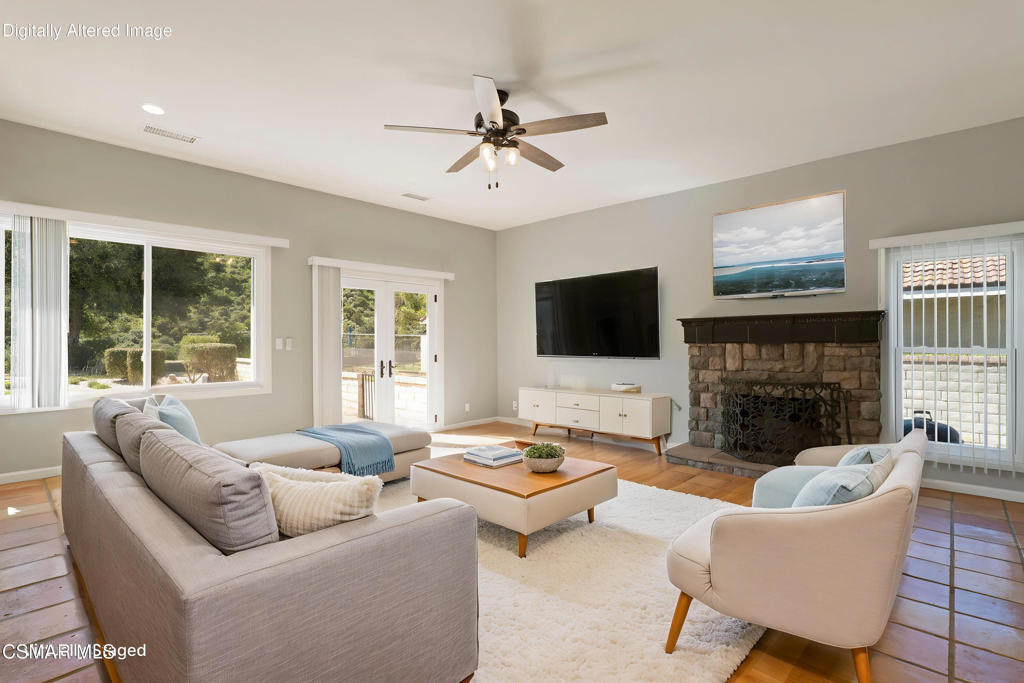 1590 Meander Drive Simi Valley, CA 93065 - Photo 9 of 57 a living room with furniture fireplace and a flat screen tv