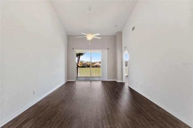 a view of a glass door with a balcony