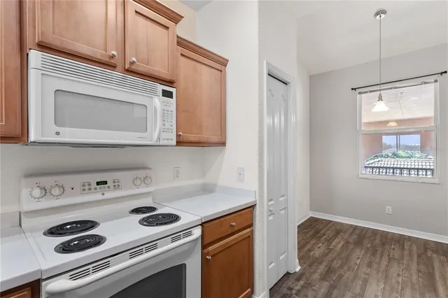 a bathroom with a sink a vanity and mirror