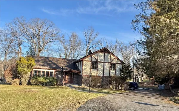a view of a building with trees