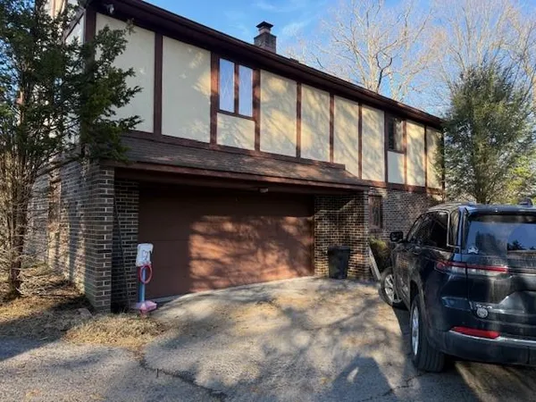 a view of a bike storage and utility room