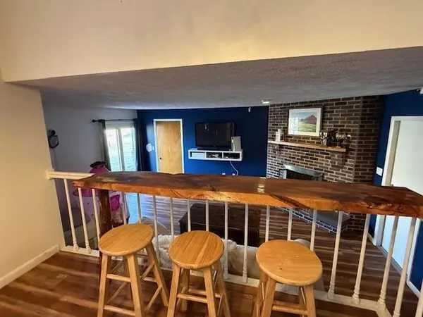 a view of a chairs and table in the patio