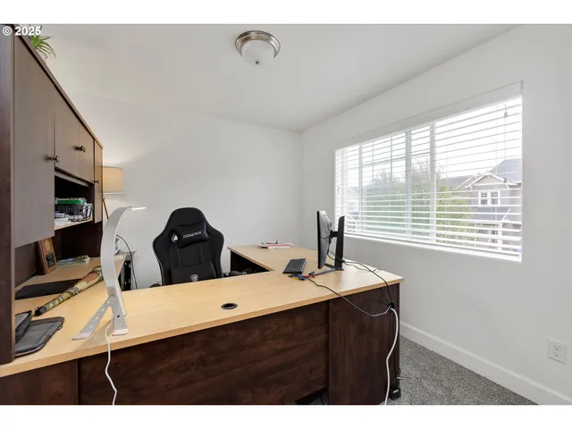 a kitchen with a sink cabinets and appliances