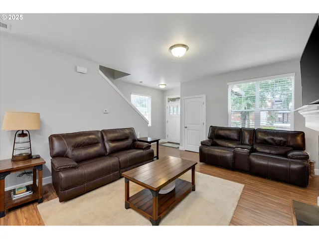 a living room with furniture and a couch