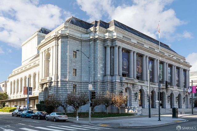 a view of a building with a street