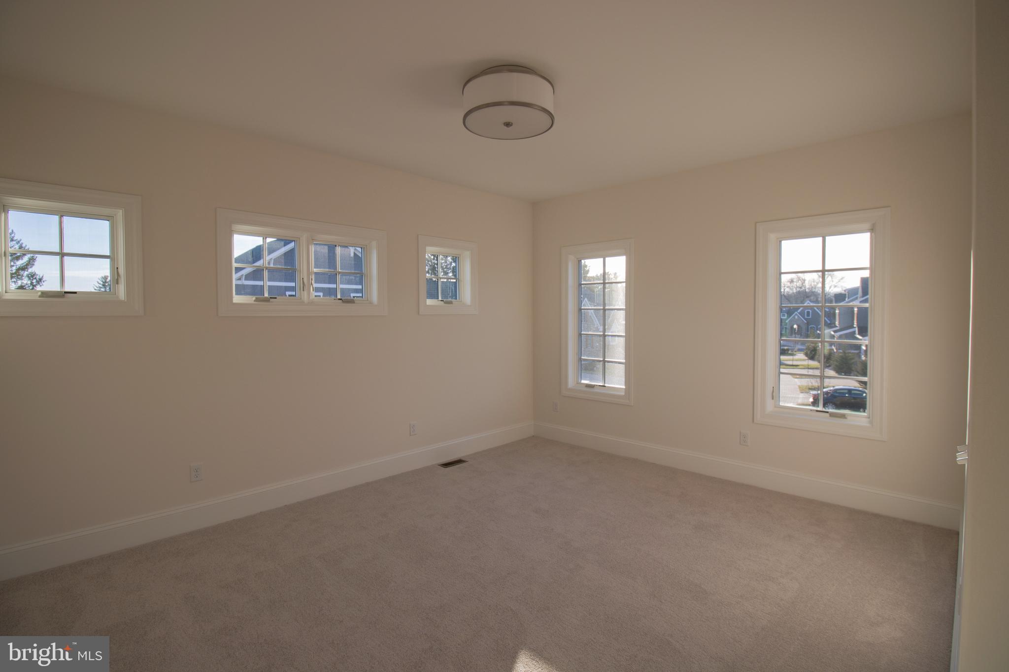 1115 Invermere Road Wilmington, DE 19803 - Photo 15 of 16 an empty room with windows