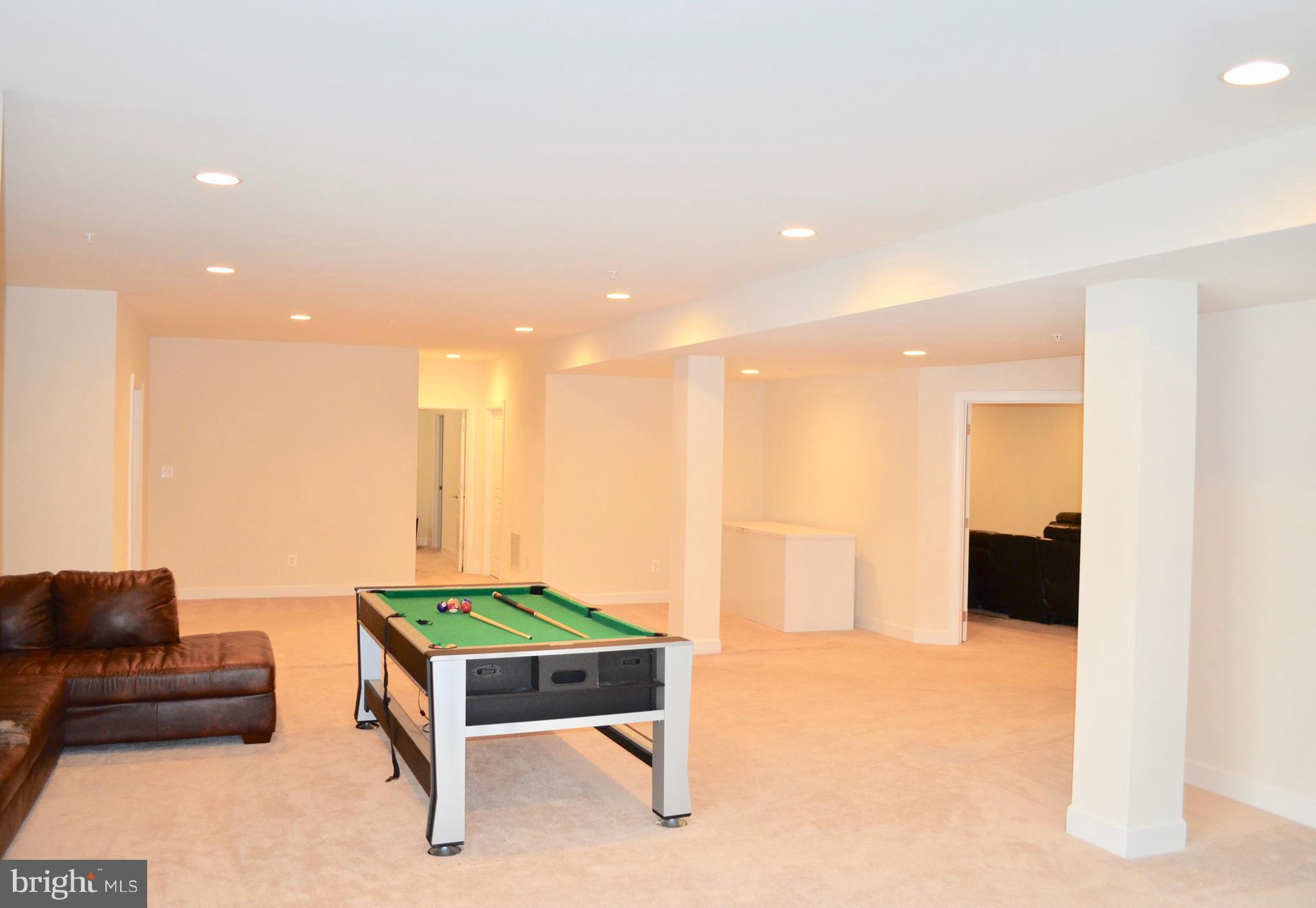 12905 Isaac Duckett Road Bowie, MD 20721 - Photo 15 of 18 Rec Room with 1,200 Square Feet of Living Space