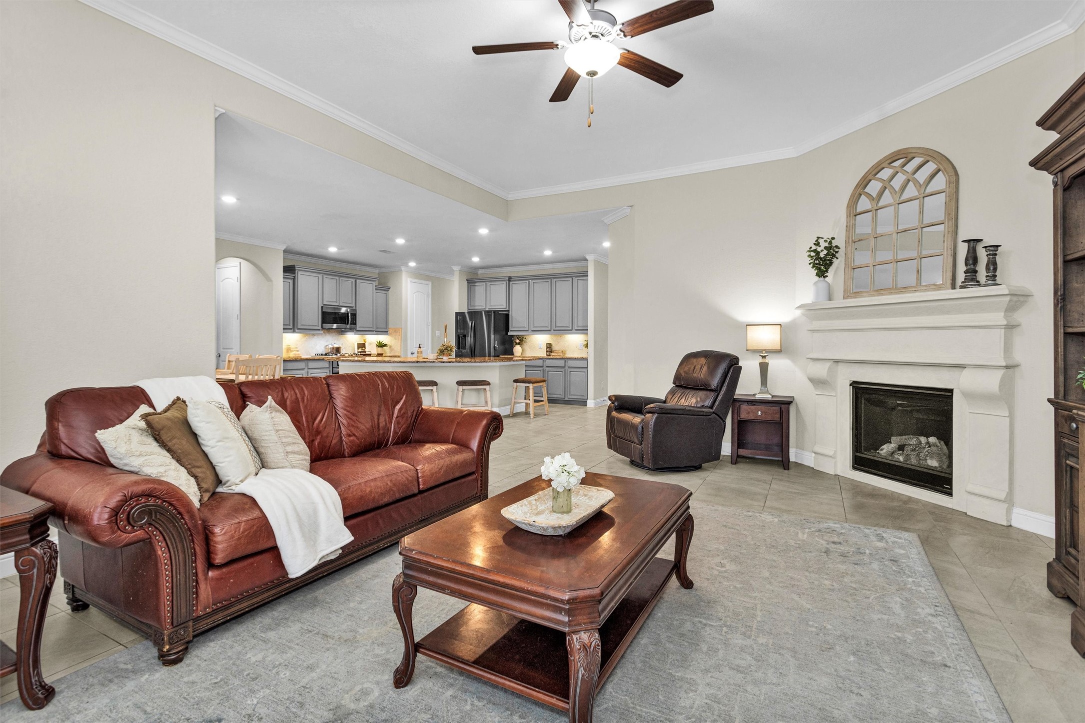 3622 Lister Drive Rosharon, TX 77583 - Photo 11 of 49 Here you can see how the living room is open to the kitchen and dining area. Perfect for the chef in your life to do their thing while still feeling included.