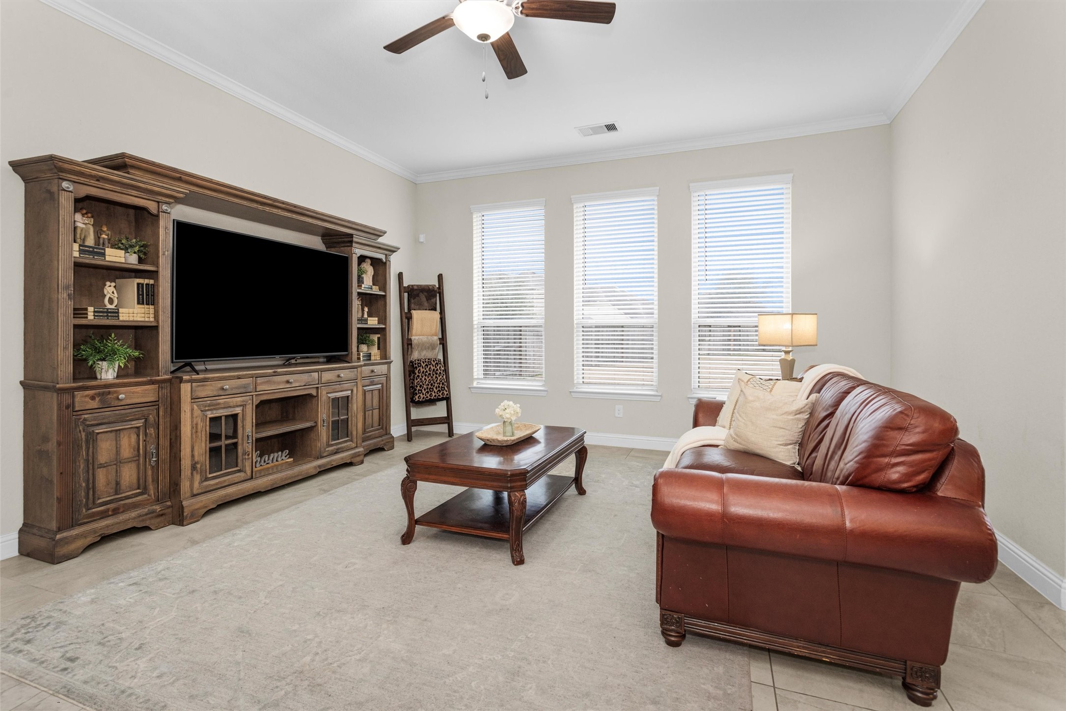 3622 Lister Drive Rosharon, TX 77583 - Photo 10 of 49 Walking straight after entering your new front door, you will pass the office, dining room and secondary bedroom with full bath then enter into your new spacious living room which is open to the kitchen and dining area creating the most perfect area for entertaining!