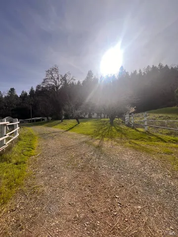 a view of a swimming pool and an outdoor seating
