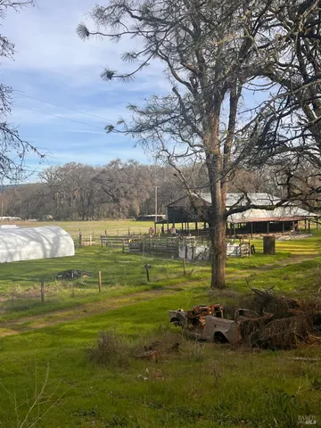 a view of a lake with a big yard