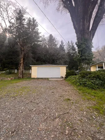 a house view with a backyard space