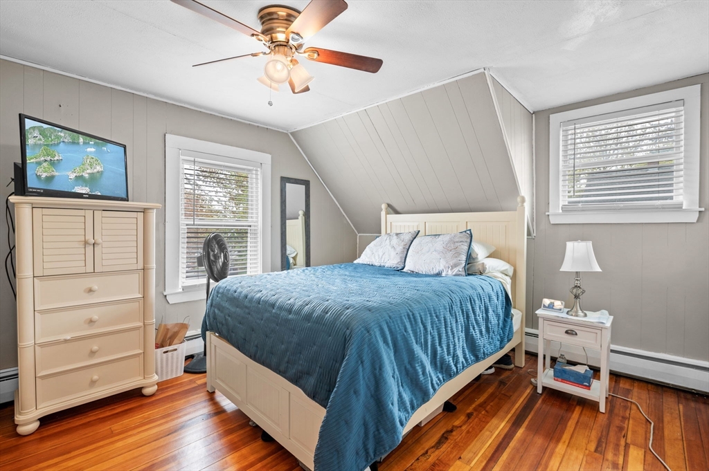 42 Chase Street Danvers, MA 01923 - Photo 15 of 37 a bedroom with a bed and a window