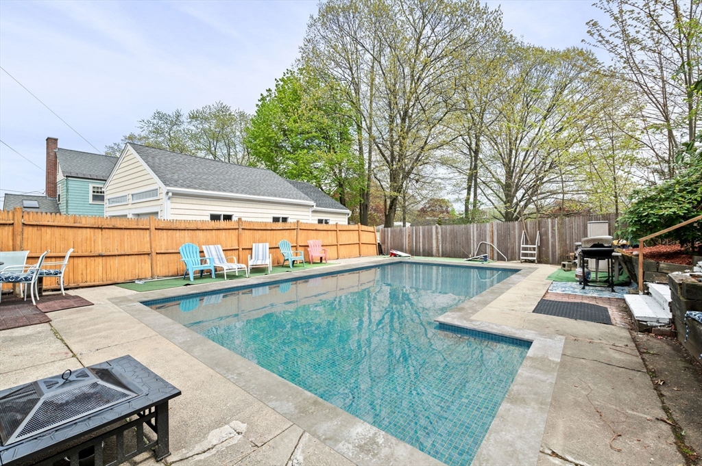 42 Chase Street Danvers, MA 01923 - Photo 30 of 37 a view of a swimming pool with a patio