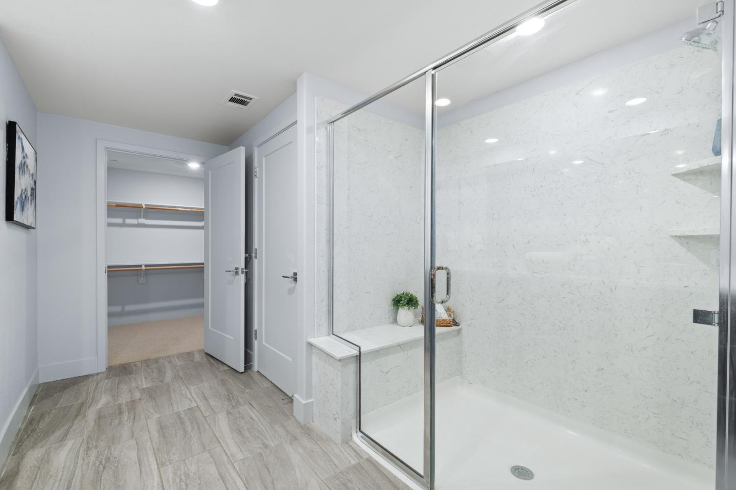 330 Riesling Avenue, Unit 23 Milpitas, CA 95035 - Photo 28 of 51 a bathroom with a bathtub and a shower