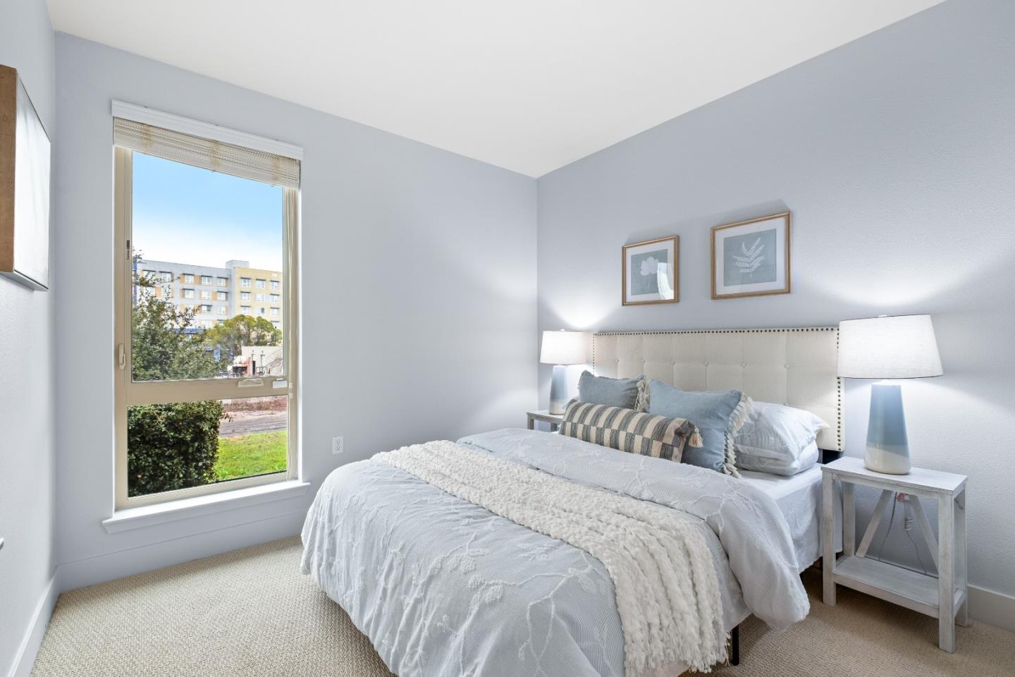 330 Riesling Avenue, Unit 23 Milpitas, CA 95035 - Photo 30 of 51 a bedroom with a bed and a window