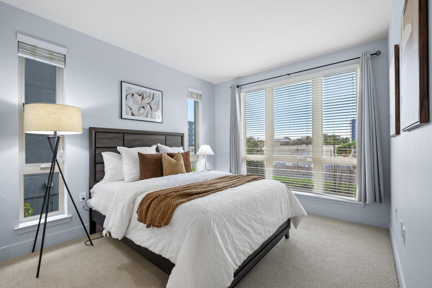 330 Riesling Avenue, Unit 23 Milpitas, CA 95035 - Photo 33 of 51 a bedroom with a bed a lamp and a window