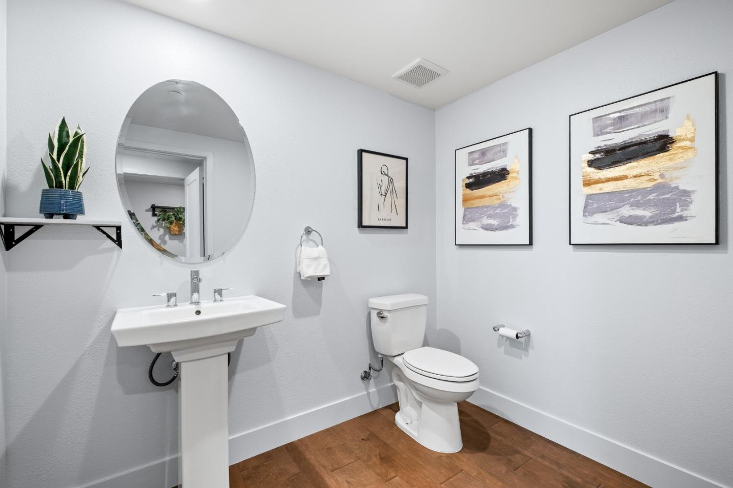 330 Riesling Avenue, Unit 23 Milpitas, CA 95035 - Photo 36 of 51 a bathroom with a toilet sink and mirror