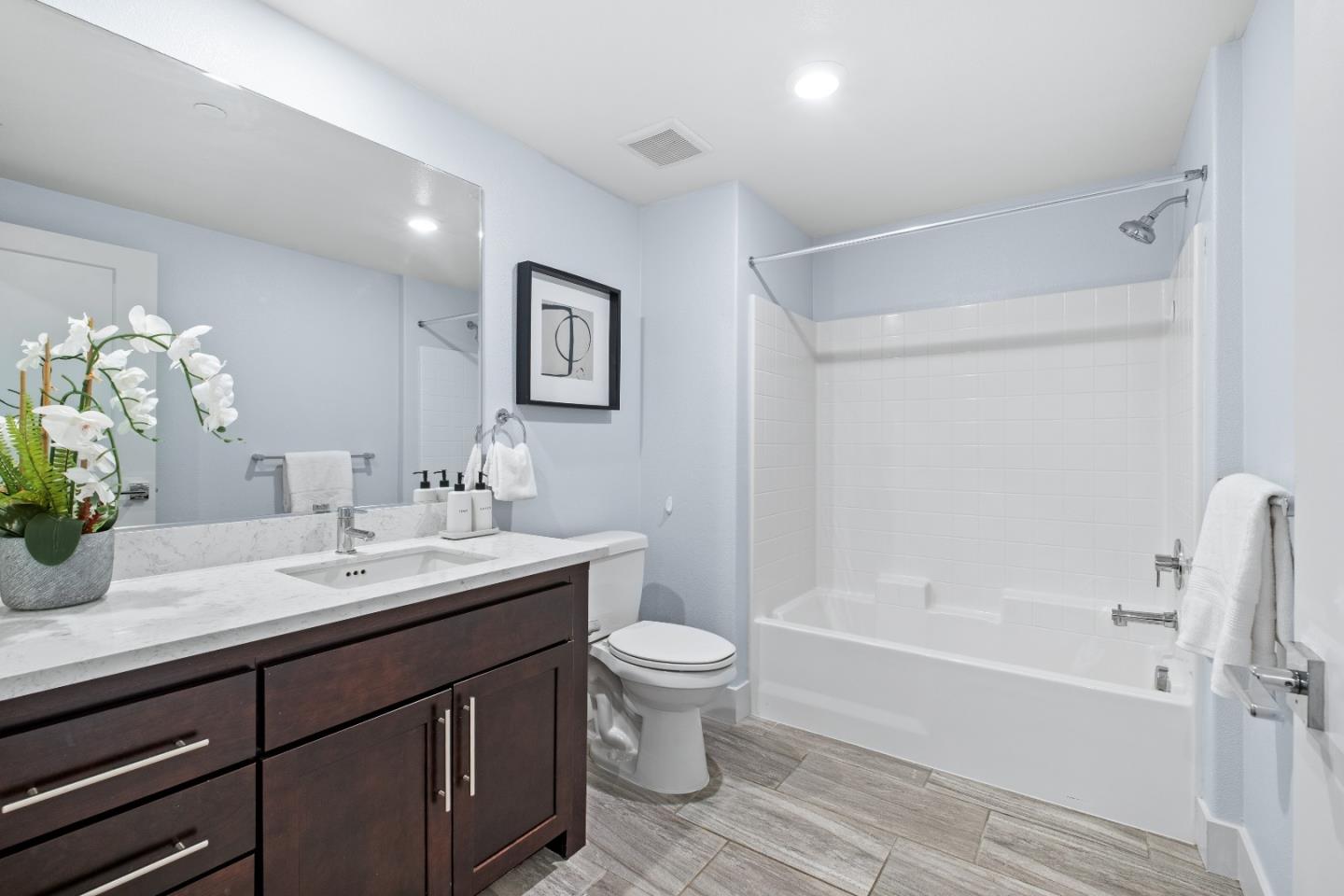 330 Riesling Avenue, Unit 23 Milpitas, CA 95035 - Photo 37 of 51 a bathroom with a sink a toilet and a bathtub