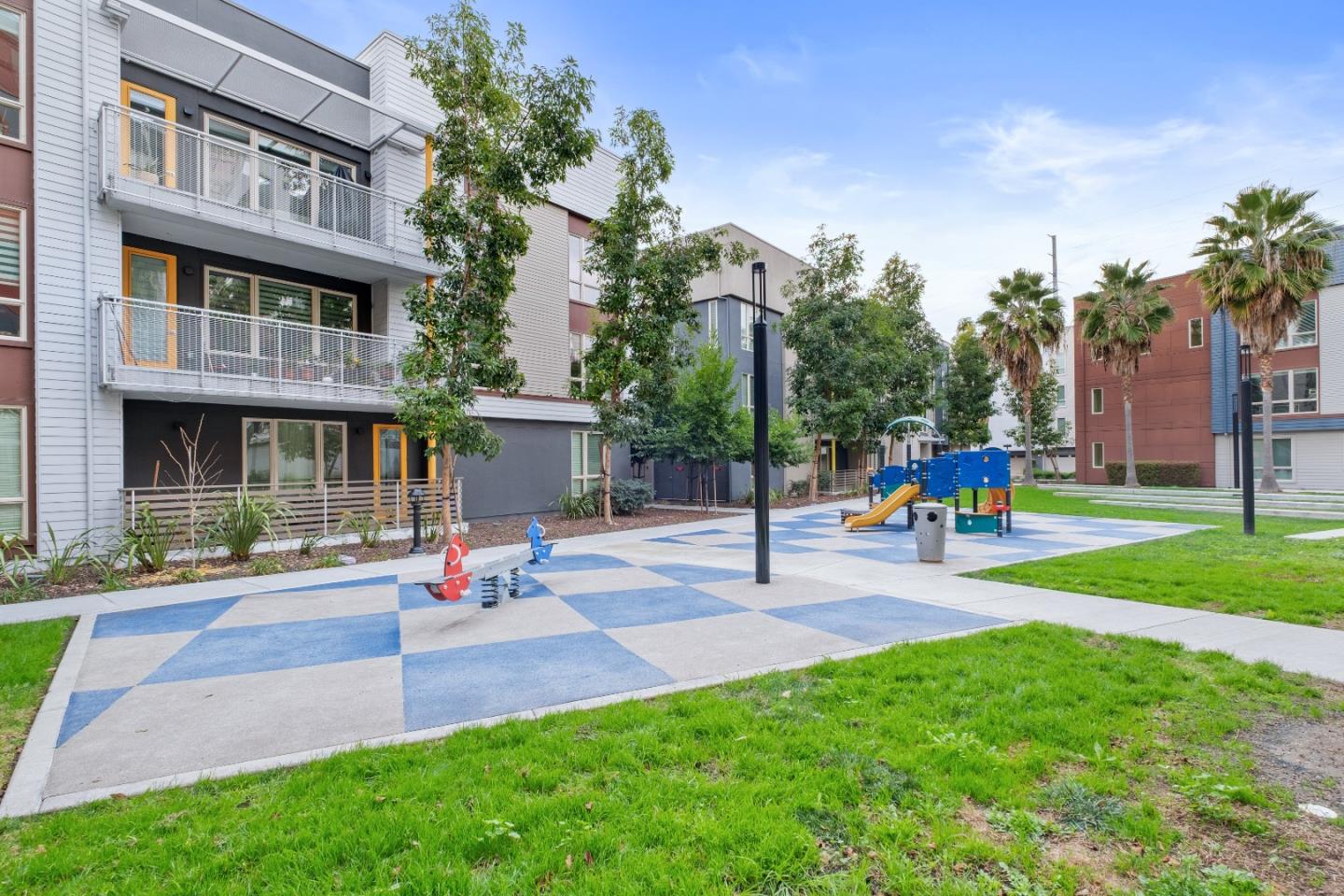 330 Riesling Avenue, Unit 23 Milpitas, CA 95035 - Photo 39 of 51 a front view of multiple houses with yard