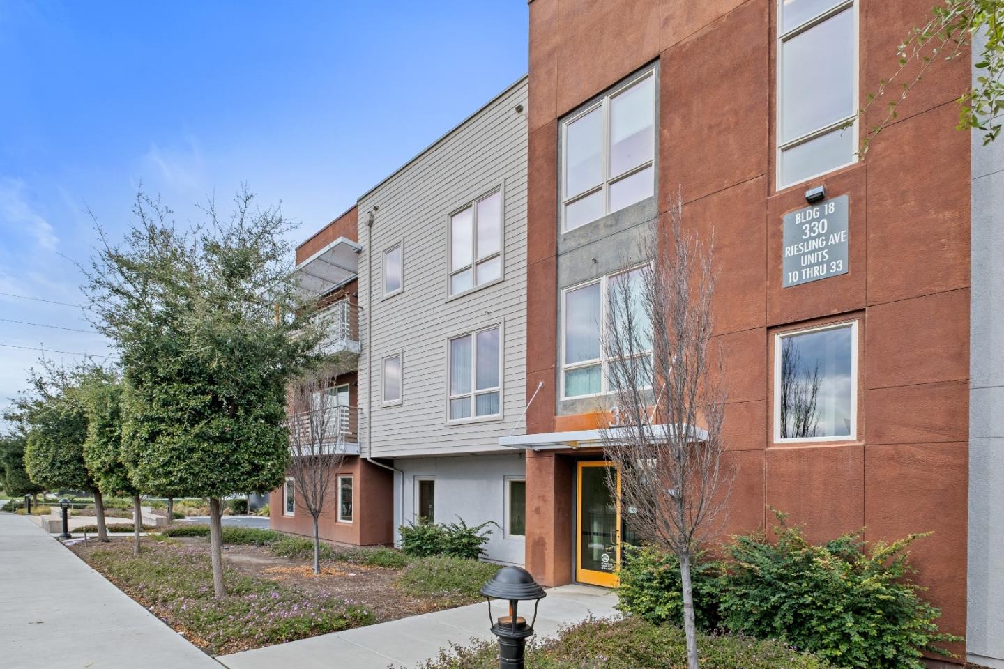 330 Riesling Avenue, Unit 23 Milpitas, CA 95035 - Photo 42 of 51 a view of a building with a street