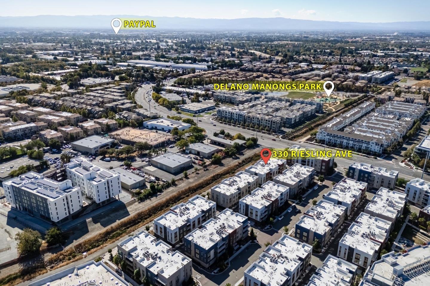 330 Riesling Avenue, Unit 23 Milpitas, CA 95035 - Photo 50 of 51 an aerial view of a swimming pool patio and mountain view