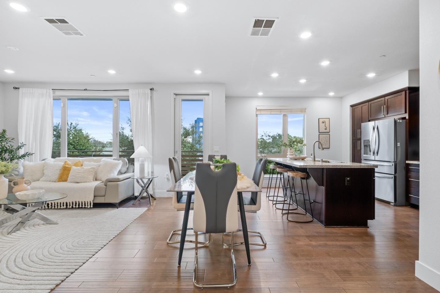 330 Riesling Avenue, Unit 23 Milpitas, CA 95035 - Photo 10 of 51 a view of a dining room with furniture window and wooden floor
