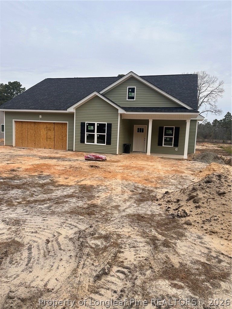 131 Merle Road Pinebluff, NC 28373 - Photo 2 of 6 a front view of a house with yard