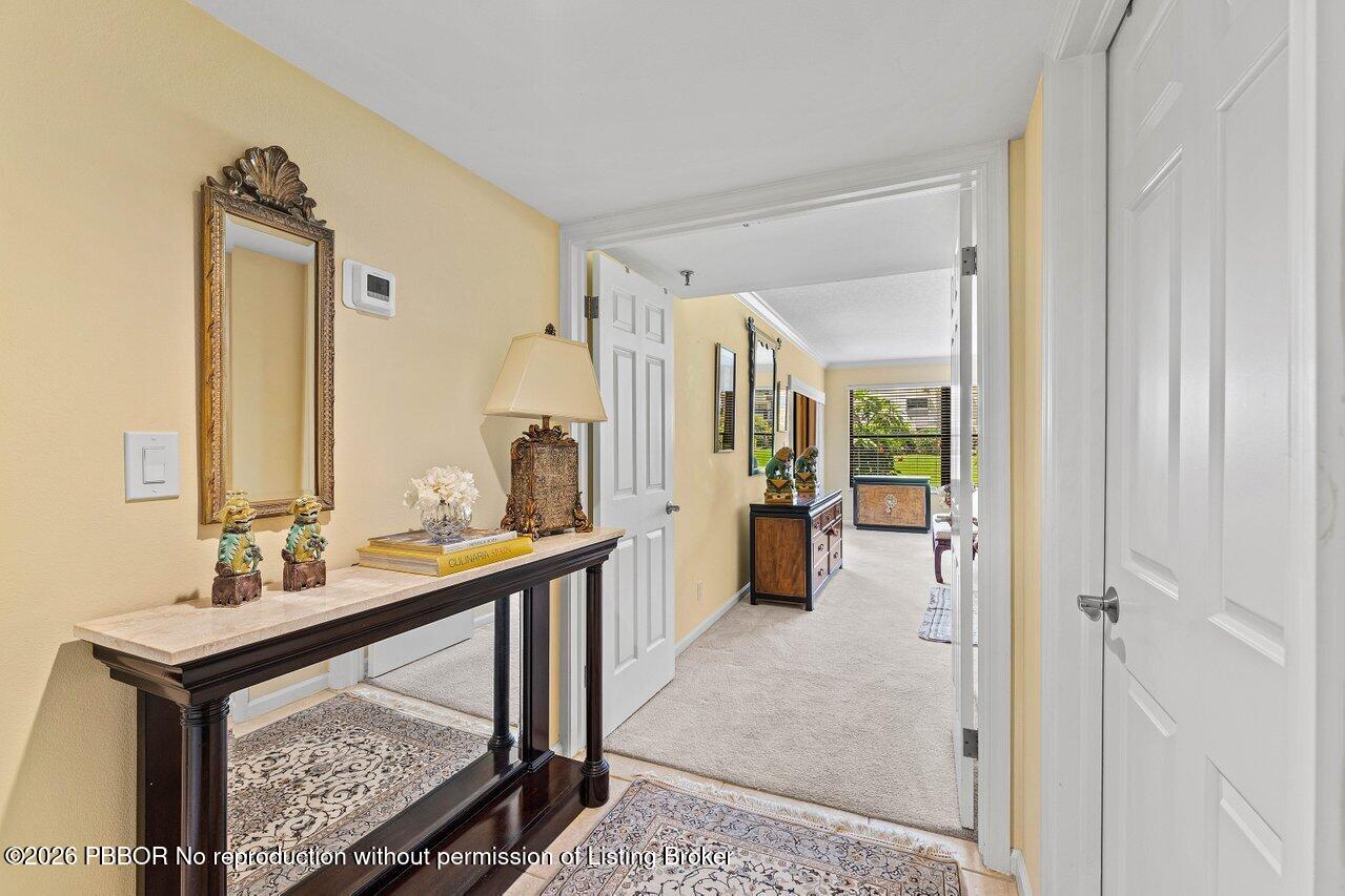 372 Golfview Road, Unit 101 North Palm Beach, FL 33408 - Photo 21 of 31 Walkway to Main Bedroom