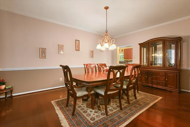 a aerial view of a house with a yard and plants