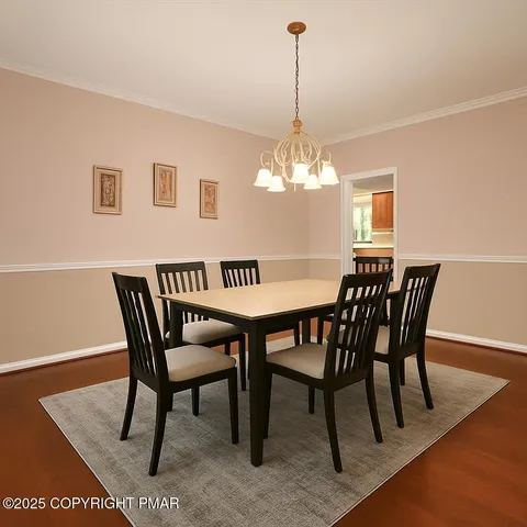 a view of a house with a tree in a yard