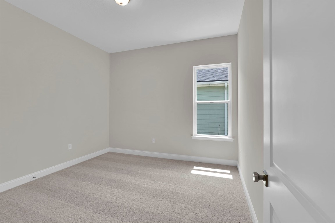 323 Sawgrass Drive Yulee, FL 32097 - Photo 12 of 33 an empty room with a window