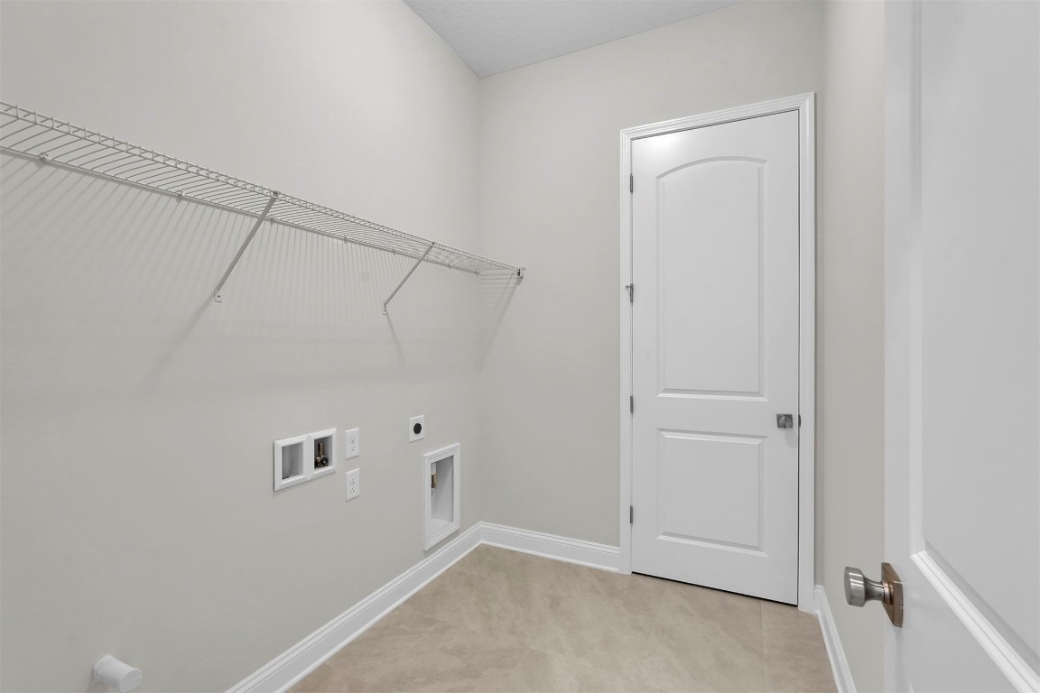 323 Sawgrass Drive Yulee, FL 32097 - Photo 10 of 33 a view of a room with racks on the wall