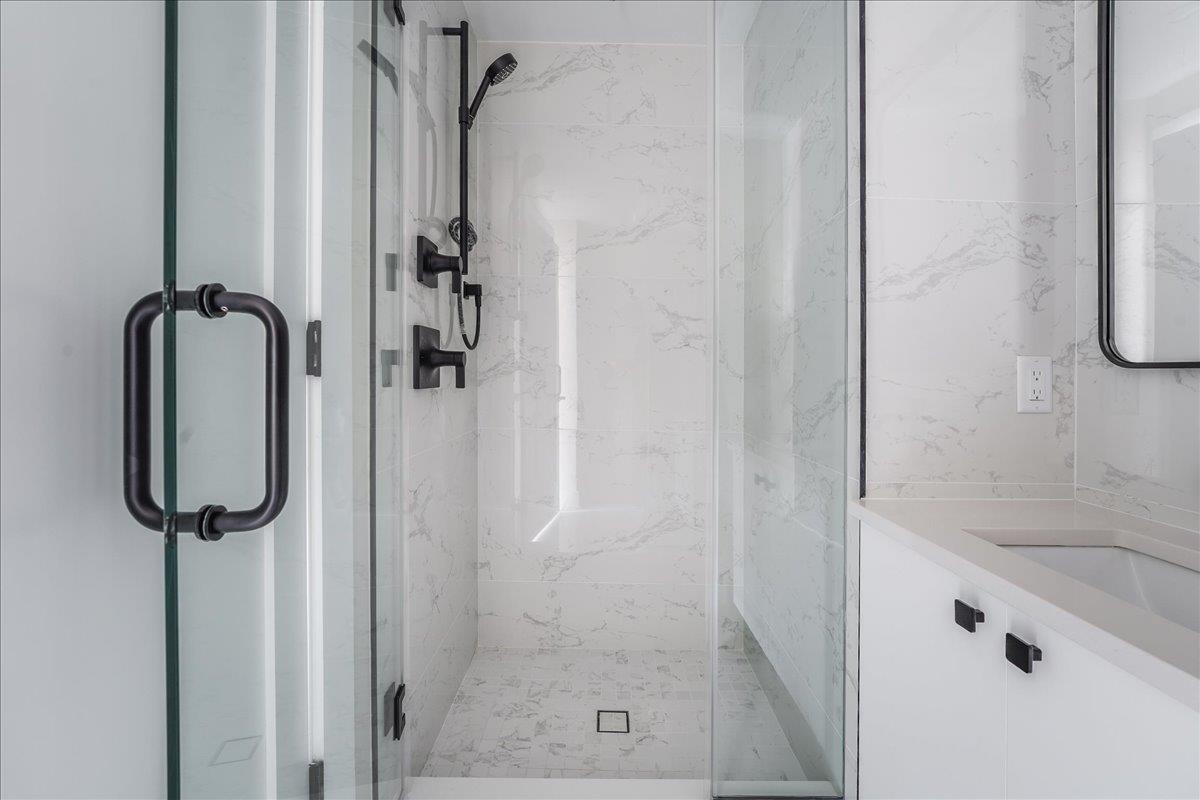 237 Washington Street, Unit 402 Hoboken, NJ 07030 - Photo 18 of 36 a bathroom with a shower