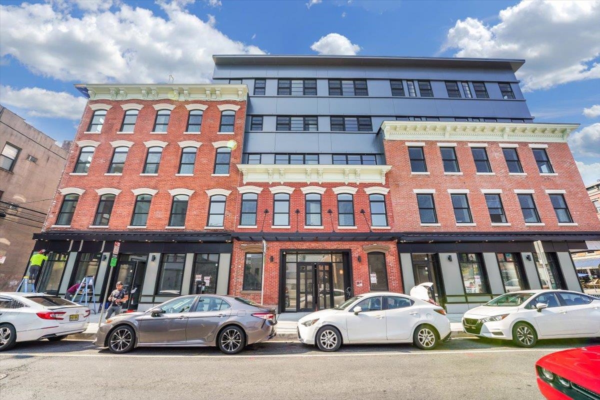 237 Washington Street, Unit 402 Hoboken, NJ 07030 - Photo 36 of 36 a car parked in front of a building