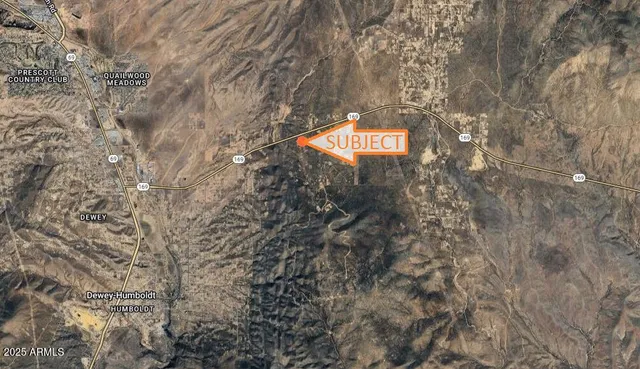 a sign that is on a brick wall