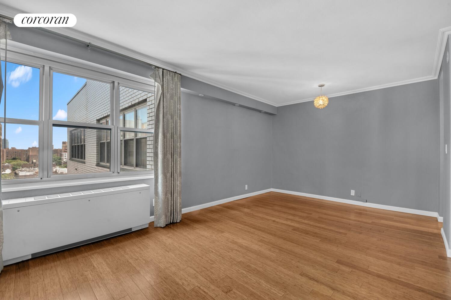 205 3rd Avenue, Unit 12A Manhattan, NY 10003 - Photo 8 of 11 a view of an empty room with a window