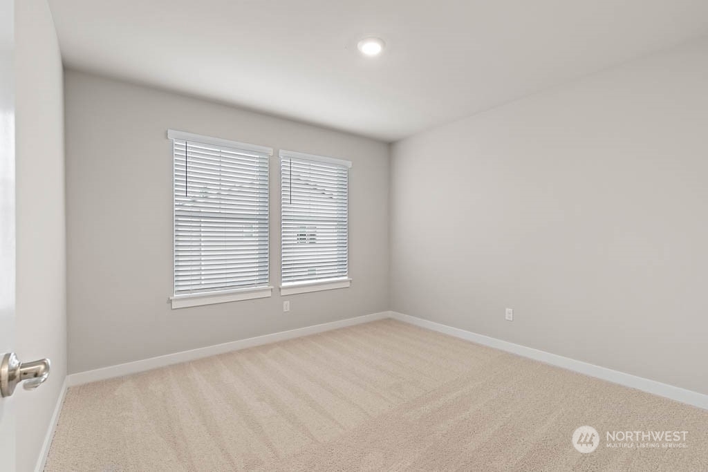 4403 228th Place South East, Unit 14 Bothell, WA 98021 - Photo 14 of 22 an empty room with a window