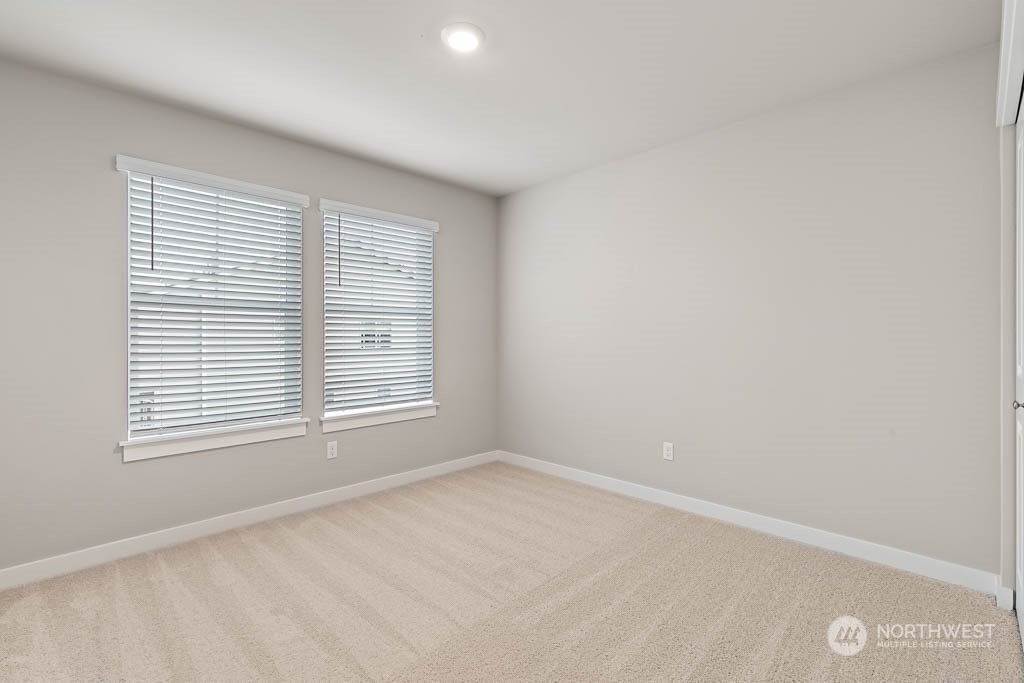 4403 228th Place South East, Unit 14 Bothell, WA 98021 - Photo 15 of 22 a view of an empty room with a window