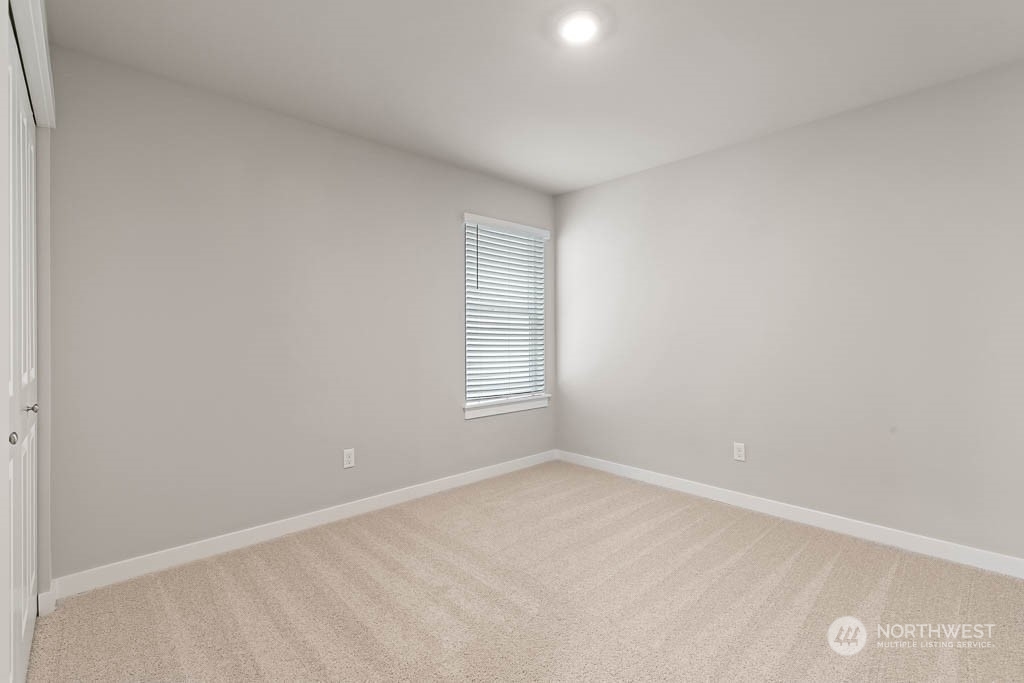 4403 228th Place South East, Unit 14 Bothell, WA 98021 - Photo 16 of 22 an empty room with a window